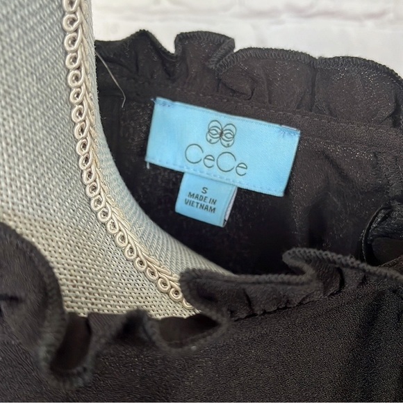 CECE Mock Neck Ruffled Flutter Sleeve Top - Picture 9 of 11